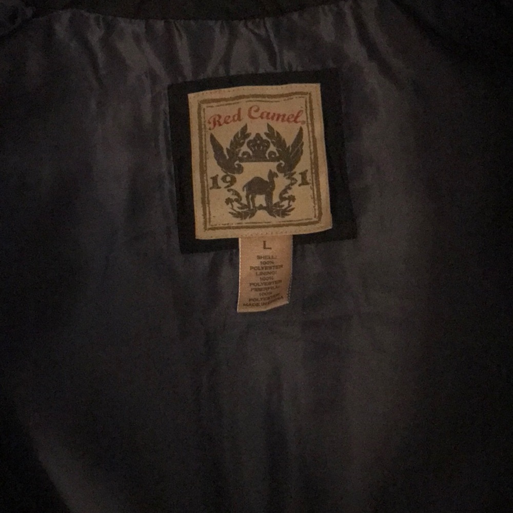 Mans Red Camel brand black puffy vest.